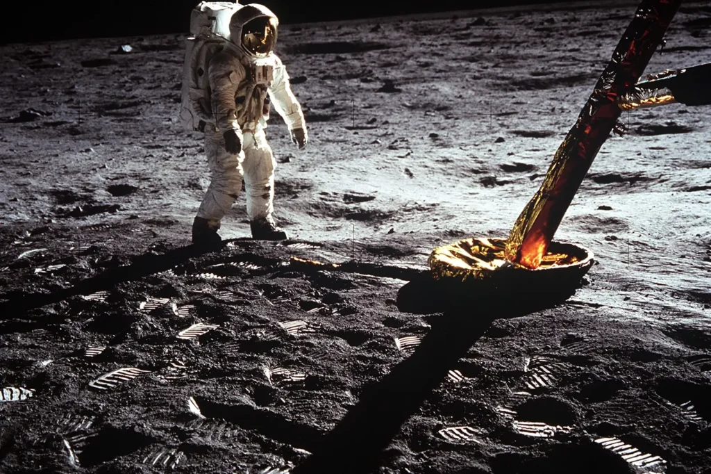 Astronaut Buzz Aldrin walking on the Moon beside the Apollo 11 lunar module in July 1969