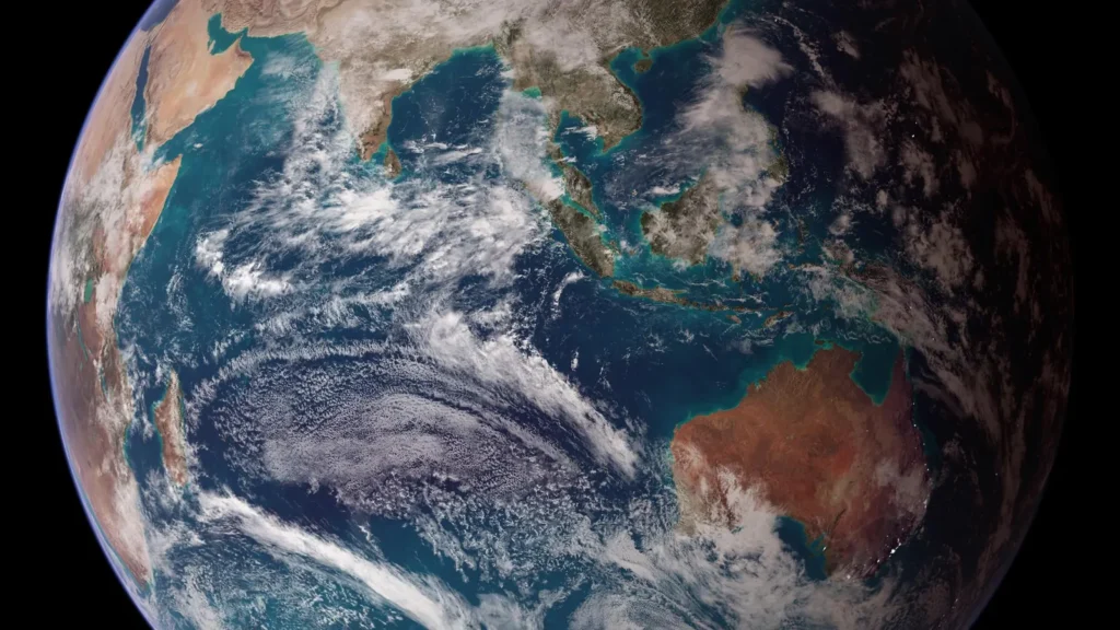 Earth from space showing Africa, the Middle East and Asia under scattered white clouds