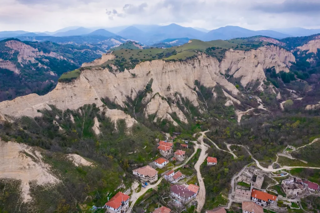 Aerial view of the Melnik sandstone pyramids and village in the mountains of south-western Bulgaria